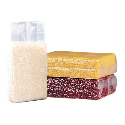 Bolsas de embalaje de plástico de nylon transparente baratas con sellado de enchufe lateral fuerte 1 kg/100 kg Bolsas de embalaje al vacío para alimentos de arroz