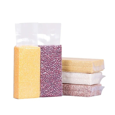 Bolsas de embalaje de plástico de nylon transparente baratas con sellado de enchufe lateral fuerte 1 kg/100 kg Bolsas de embalaje al vacío para alimentos de arroz