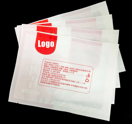 Logotipo impreso a medida Carne PE Nylon Tear Notch Sello térmico transparente Bolsas de embalaje Bolsas de sello al vacío de grado alimenticio