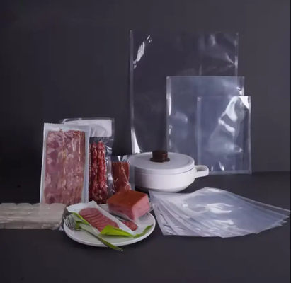 Suministro profesional Bolsas de almacenamiento de vacío a prueba de humedad personalizadas para alimentos Bolsas de vacío para alimentos Bolsa de vacío de coextrusión clara