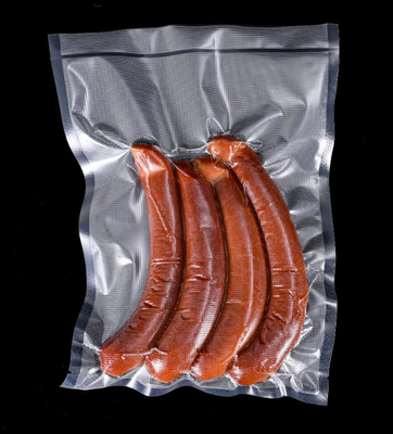 Bolsa de embalaje de vacío sellada de 3 lados precio de fábrica Bolsa de retorte de nylon de grado alimentario para alimentos congelados con muesca de lágrima