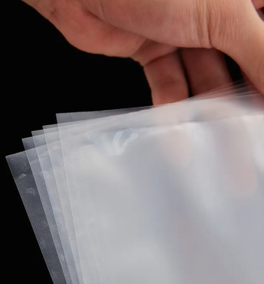 Suministro profesional Bolsas de almacenamiento de vacío a prueba de humedad personalizadas para alimentos Bolsas de vacío para alimentos Bolsa de vacío de coextrusión clara