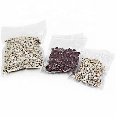 En stock y personalizado transparente transparente de nylon PE laminado plástico de almacenamiento de alimentos de embalaje cámara de vacío bolsas sellador
