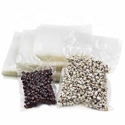 En stock y personalizado transparente transparente de nylon PE laminado plástico de almacenamiento de alimentos de embalaje cámara de vacío bolsas sellador