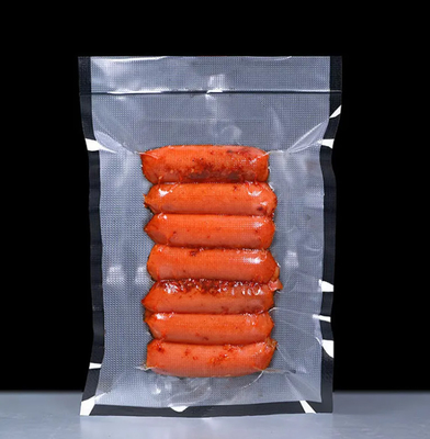 China Proveedor mayorista Bolsa de sello al vacío texturizada en relieve negro transparente embalaje de alimentos bolsas sellador al vacío
