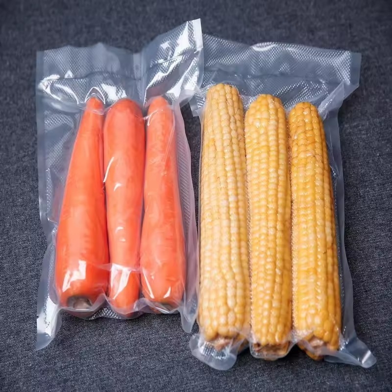Casa Almacenamiento Bolsas de vacío de plástico de nylon transparente para alimentos para el embalaje Frutas de maíz dulce