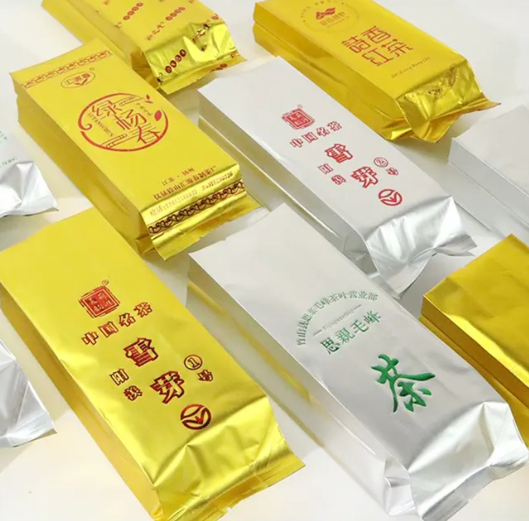 Diseño personalizado Impresión de papel de aluminio Mylar Stand Up Bolsa de sello caliente de lado bolsas de guarnición de alimentos Bolsa de embalaje de té Bolsa con logotipo