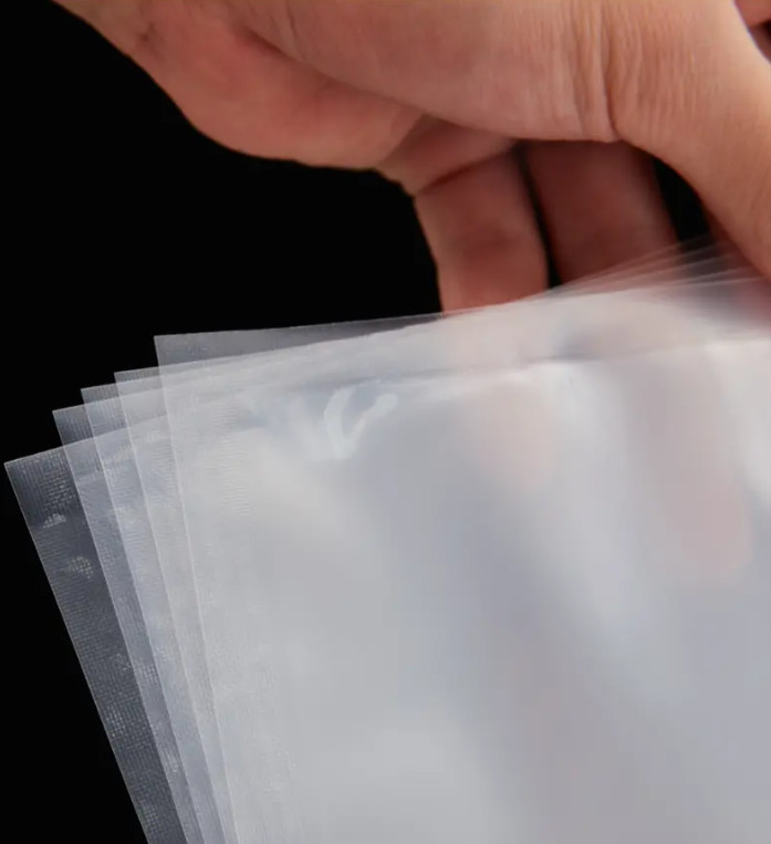 Suministro profesional Bolsas de almacenamiento de vacío a prueba de humedad personalizadas para alimentos Bolsas de vacío para alimentos Bolsa de vacío de coextrusión clara