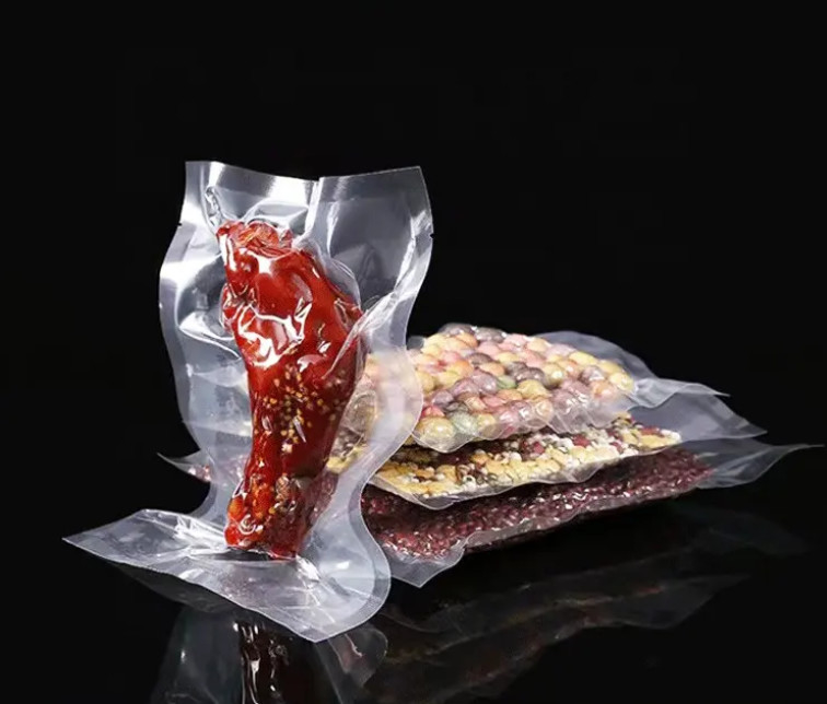 Bolsa de embalaje de vacío sellada de 3 lados precio de fábrica Bolsa de retorte de nylon de grado alimentario para alimentos congelados con muesca de lágrima